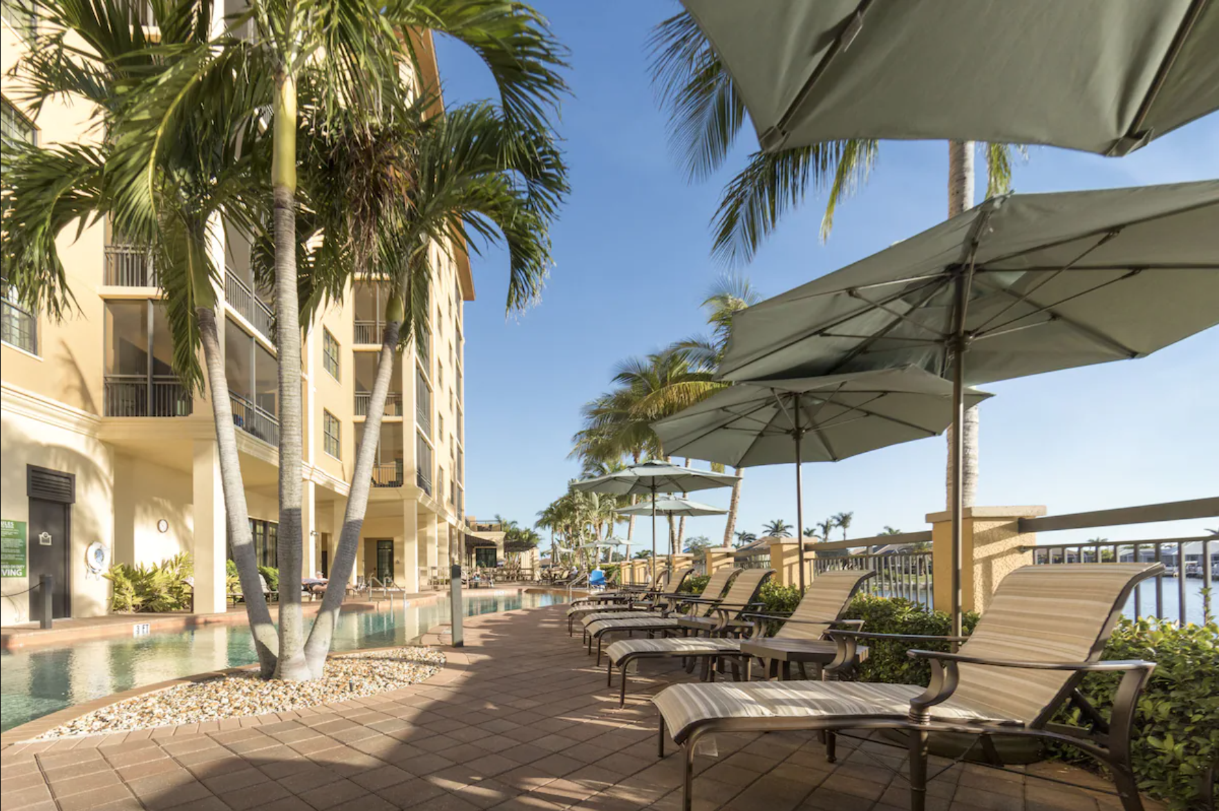 swim out rooms on the main floor with lovely beach chairs giving a sense of privacy and being able to enjoy the gorgeous florida sunshine! A great option for the best beach resorts on marco island!