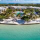 the playa largo resort and spa in the Florida Keys. it is right on the beach front with beautiful clear waters, plenty of palm trees, and lounge chairs in the back