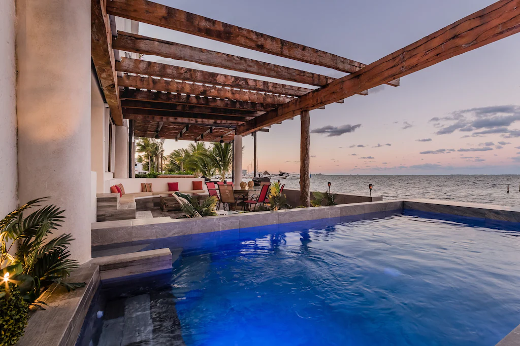 view of the beautiful private pool and Mexican sunset of the Emma Residence 