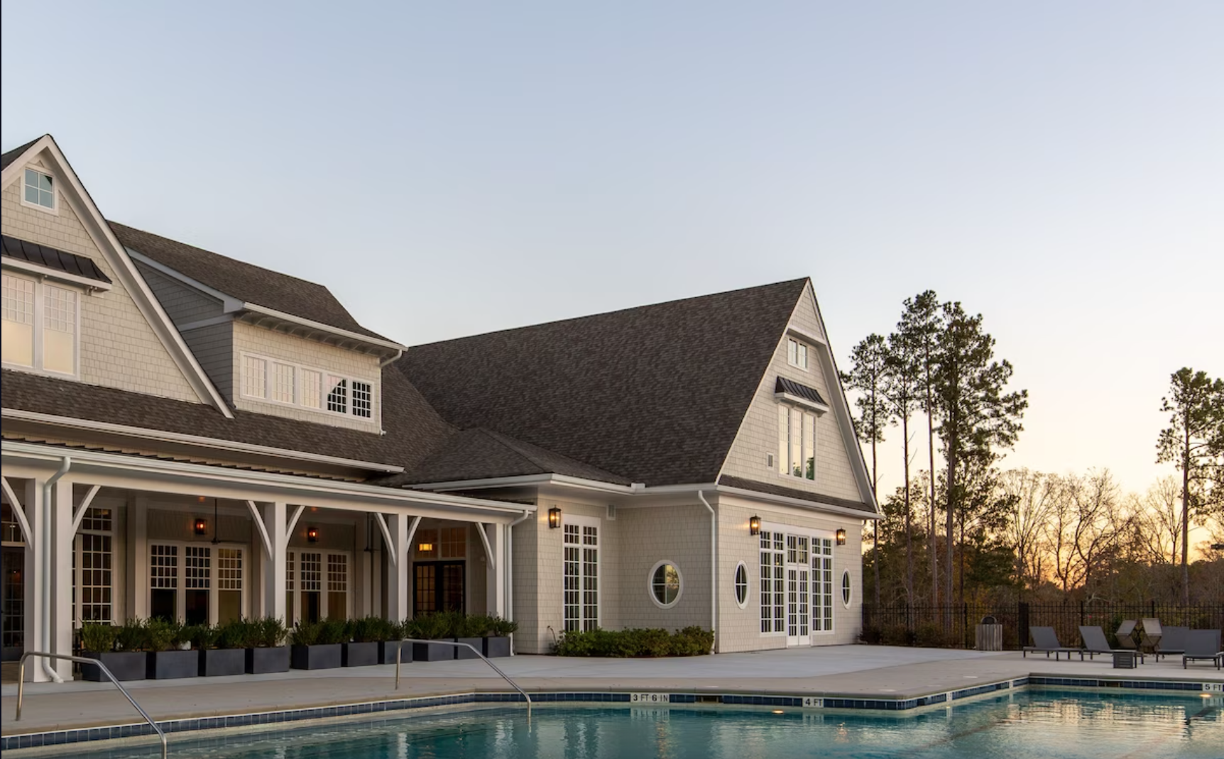 a dusky image of one of three pools showing off the beauty of the foxhall resort's property, one of the best resorts in Georgia!