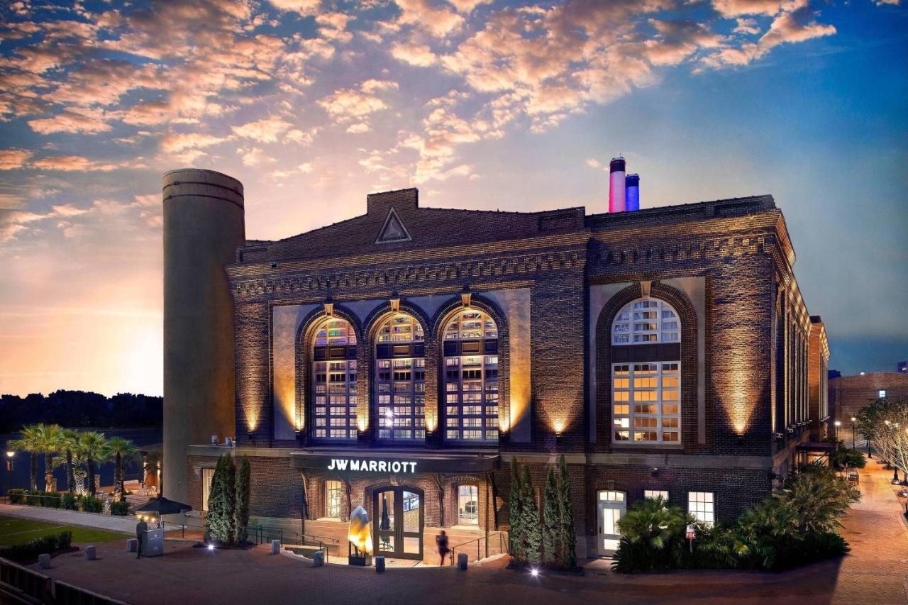 a dusky evening image with dramatic lightings and brick building with beautiful arched windows!