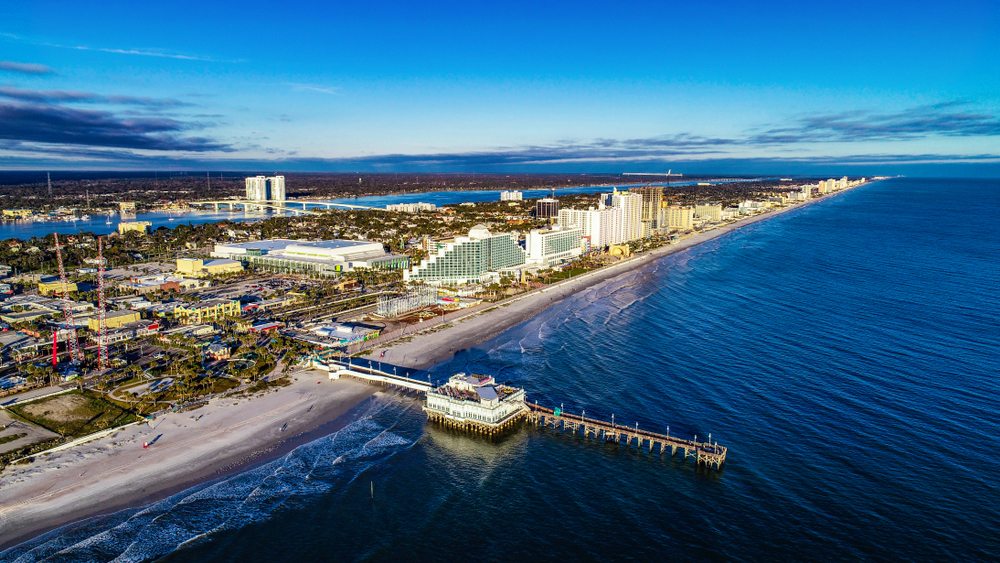 the view of Daytona Beach from the sky with a beautiful and long pier. this one of the best beaches near Orlando FL. ,