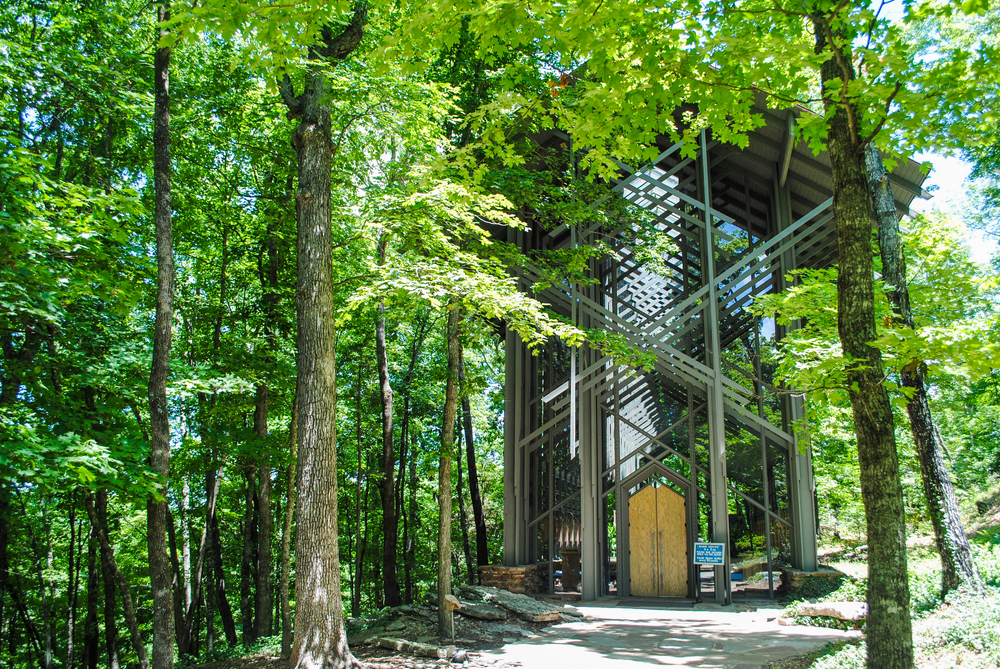 Entrance to Thorncrown Chapel with surrounding woods, one of the best things to do in AR. 
