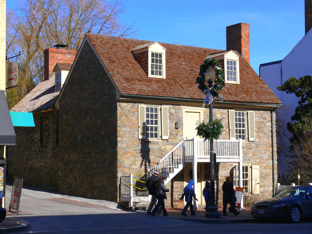 the oldest building in Georgetown area decorated with some leftover christmas wreaths, but beautiful stone architecture and one of the small museum destinations on our list of the best things to do in Georgetown!