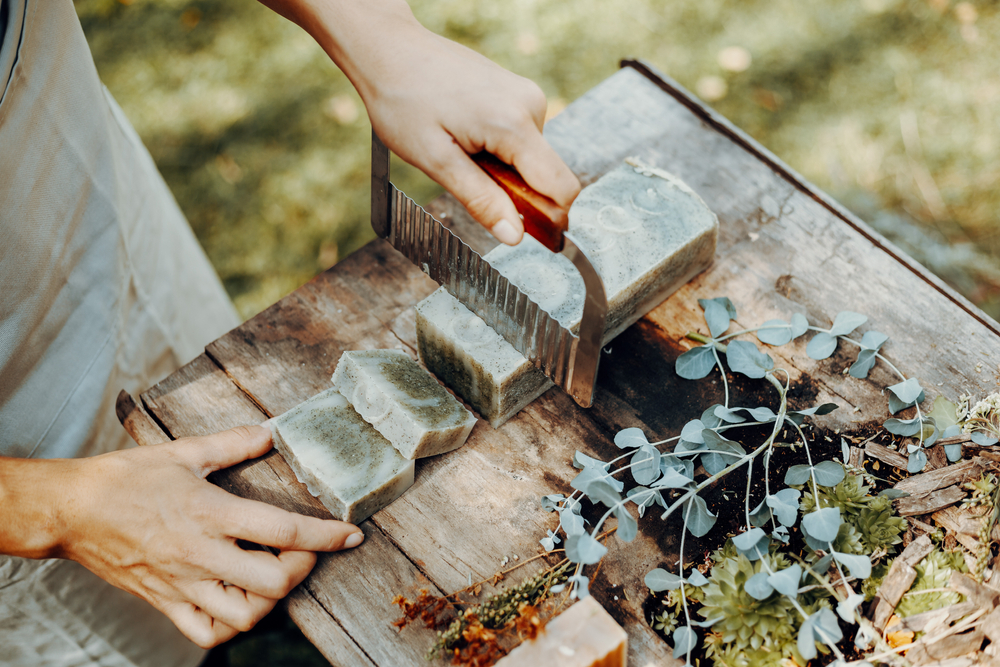 Soap maker doing their craft at the Ozark Folk Center State Park, one of our favorite things to do in AR.