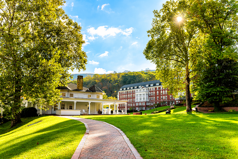 a beautiful view of the omni homestead resort with the beautiful greenery all around 