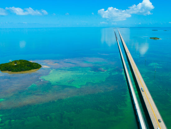 An aerial view of the Old and New 7 Mile Bridge, an iconic stop on any Miami to Key West road trip