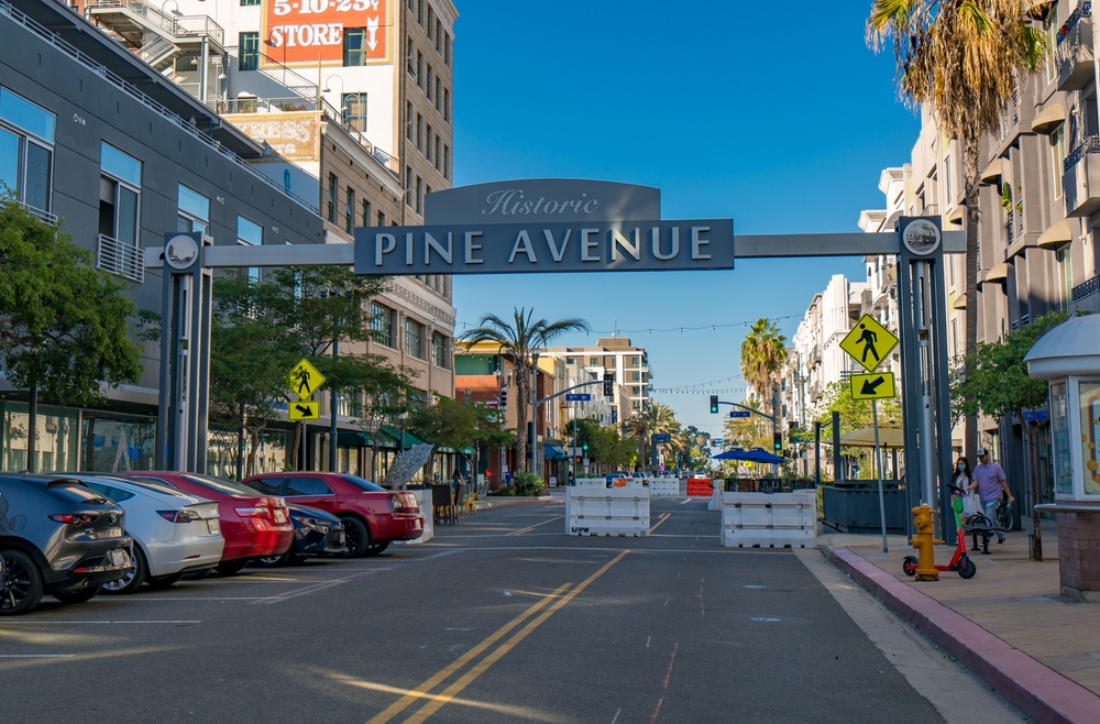 The historic pine avenue sign hangs over the strip in Anna Maria Island: exploring this area, shopping and eating here are things to do in Anna Maria Island! 