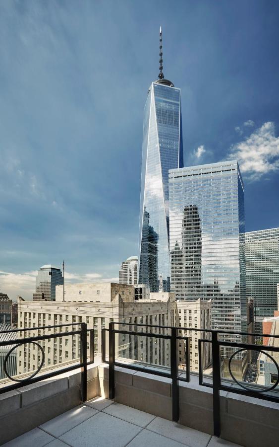 the view from one of the rooms at the four seasons New York downtown hotel. you can see the Empire State buildings as well as a view sky scrapers