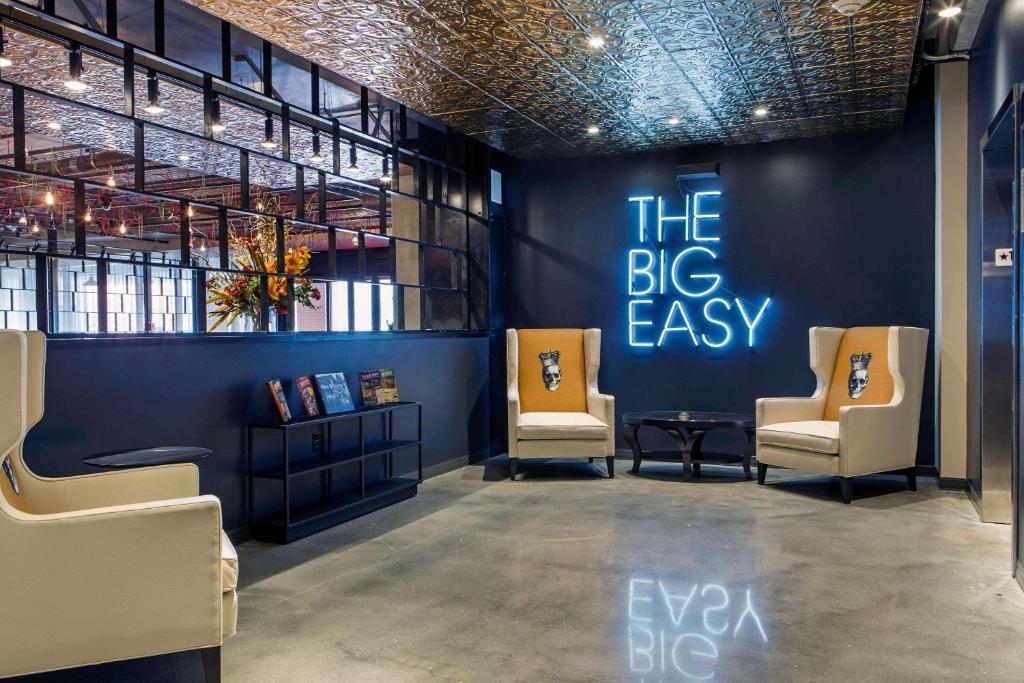 a sign saying the big easy at the Cambria hotel, in the warehouse. district in New Orleans