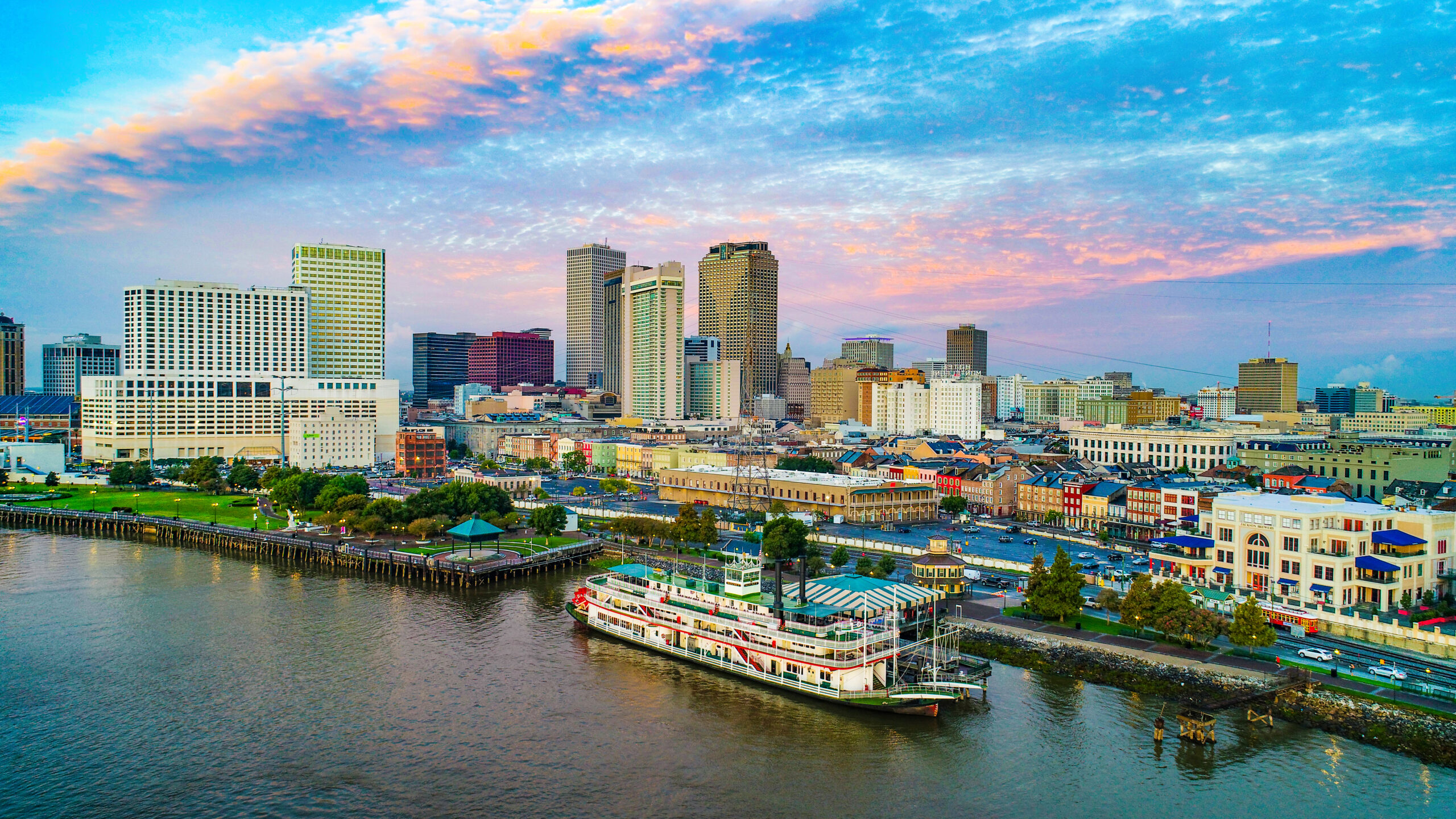 Thee city of NOLA from an plane view with the boat, river, french quarter and more