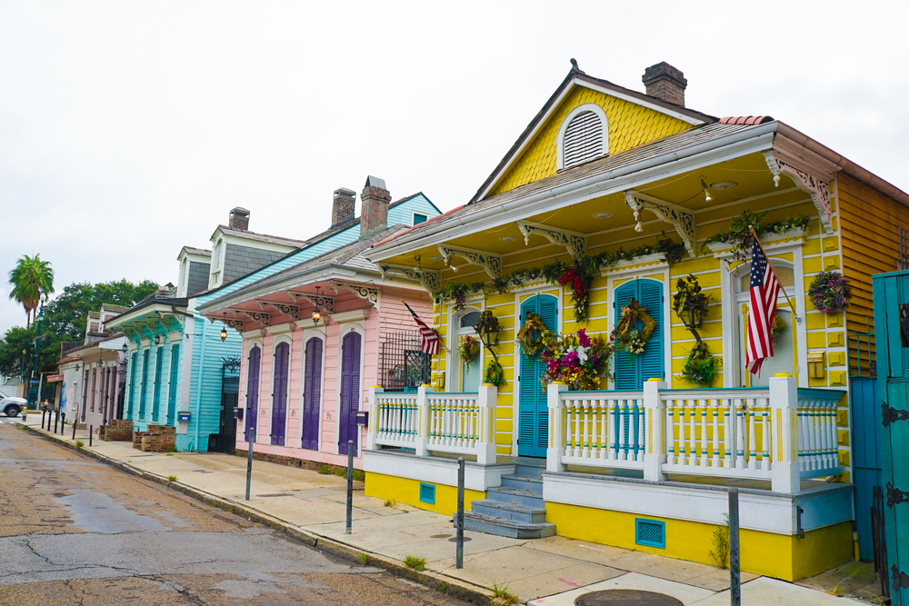 a row of colorful homes on a new orleans street