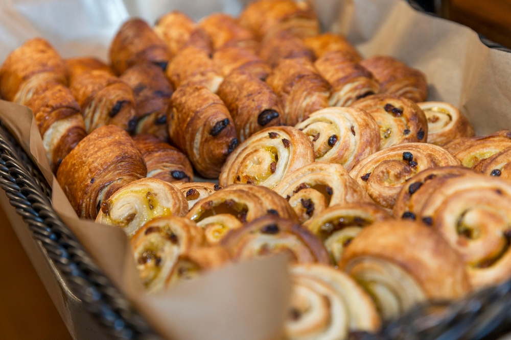 a selection of french pastries in a bakery