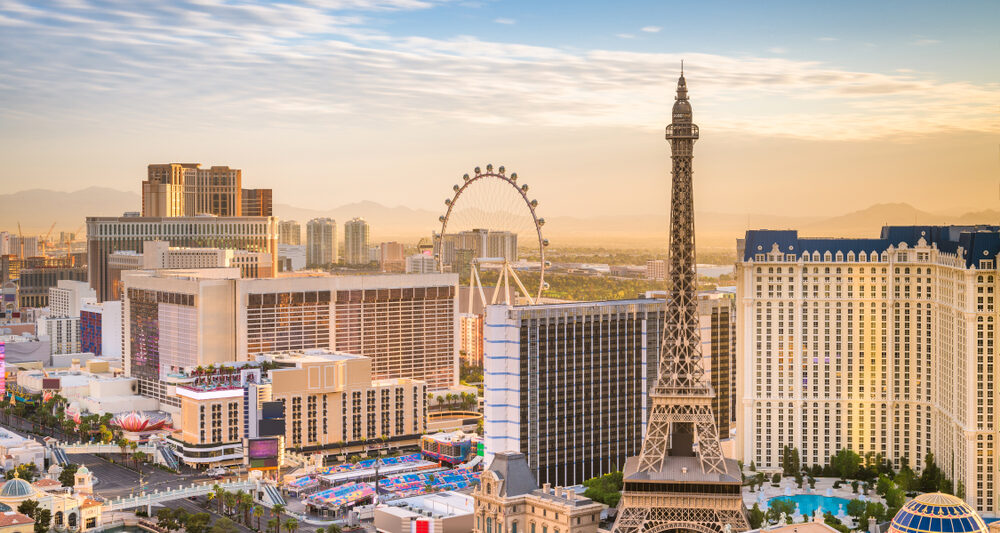 skyline view at sunrise in las vegas with buildings of hotels on the strip