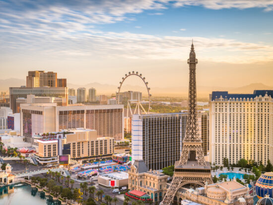 skyline view at sunrise in las vegas with buildings of hotels on the strip