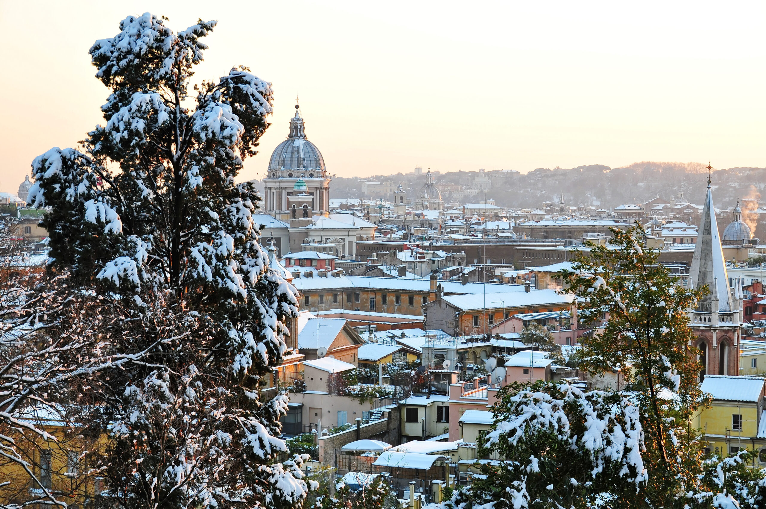 A beautiful dusting of snow over the rooftops and trees of Rome. 