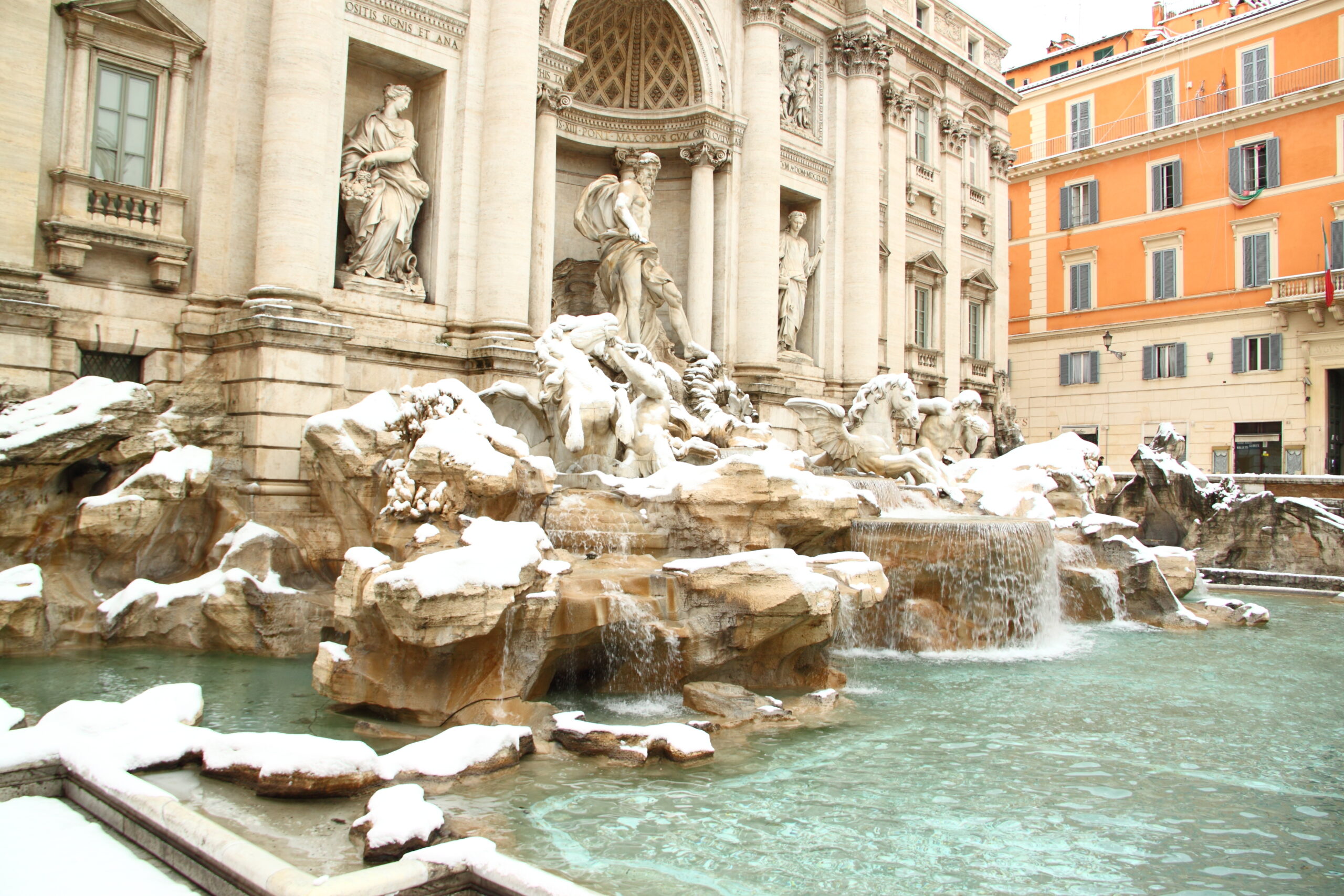 A dusting of snow on the picturesque Trevi Fountain in Rome 