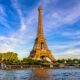 photo of the eiffel tower with blue sunset in the background