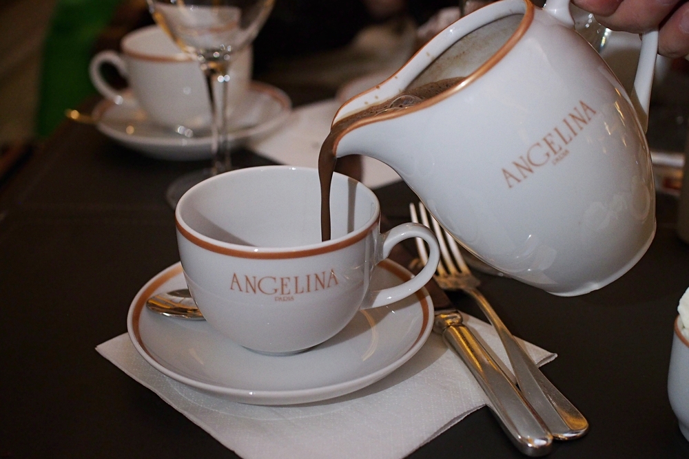 Hot chocolate being poured into a tea cup at Angelina.