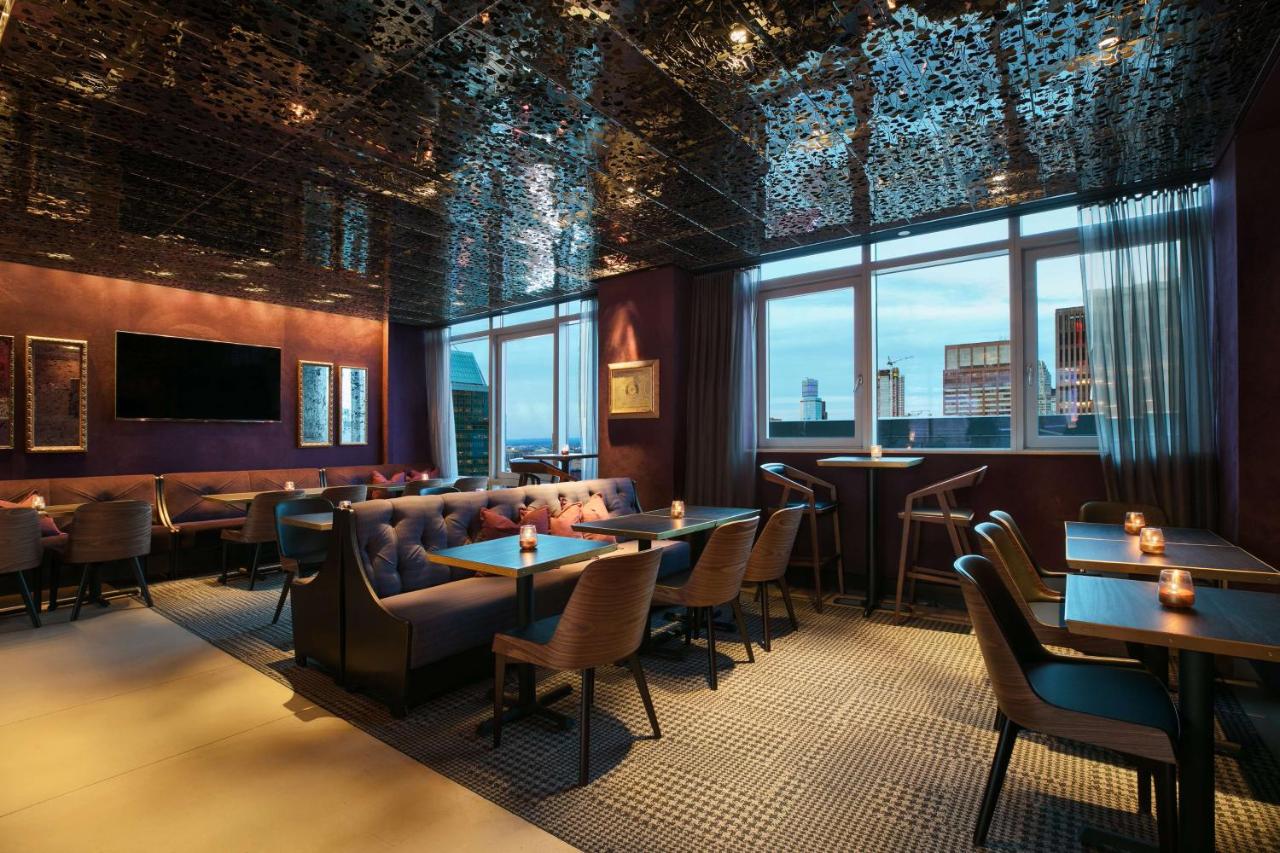 Stylish dining area at the Hyatt Centric hotel with city views.