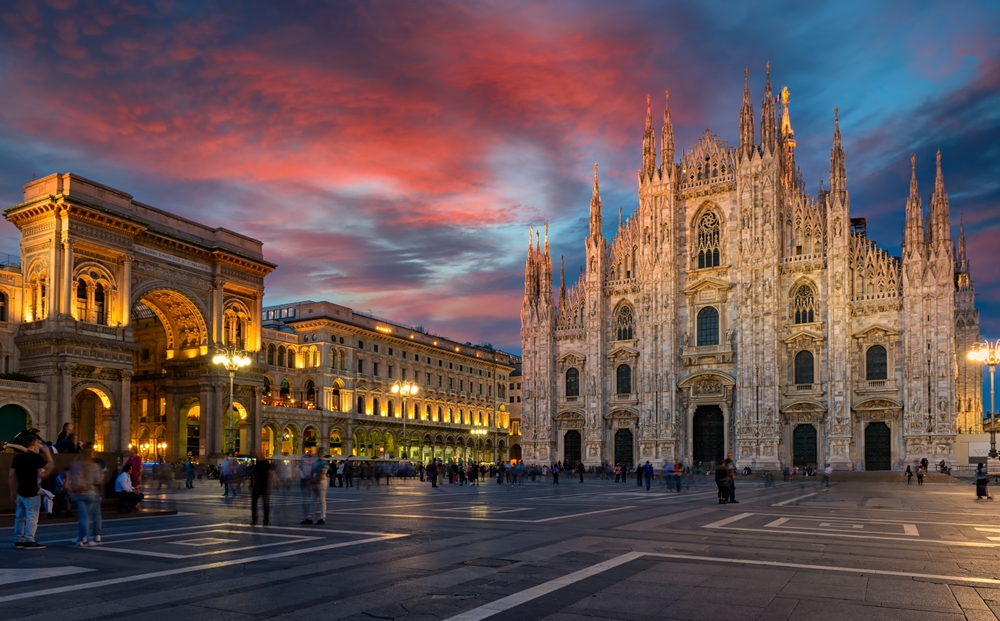 Vivid sunset over the Milan Cathedral and square.