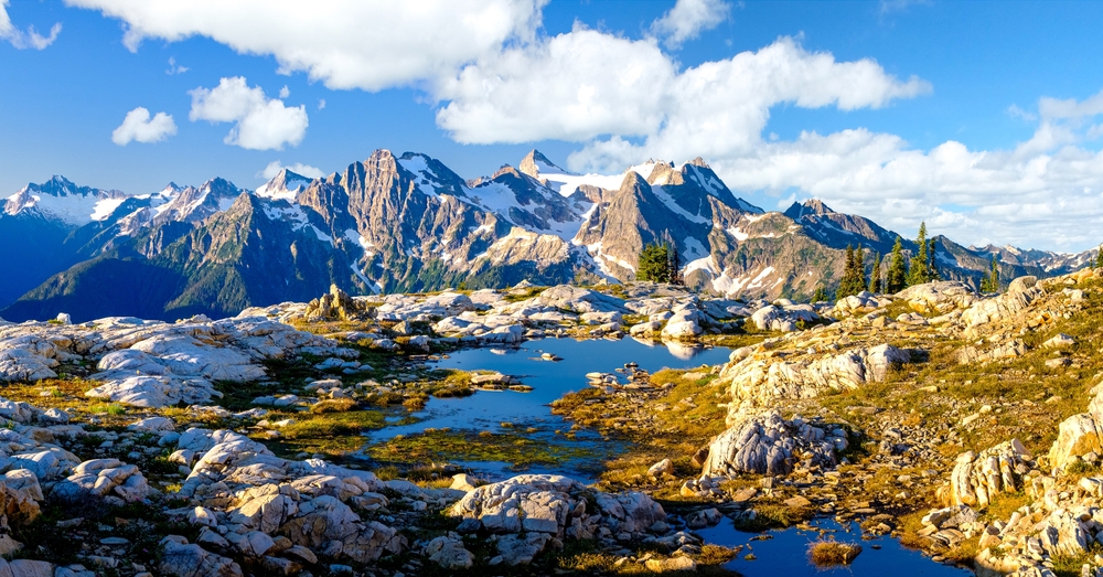 Panoramic views of mountains and lakes in the North Cascades National Park, one of the Best things to do in Washington State.