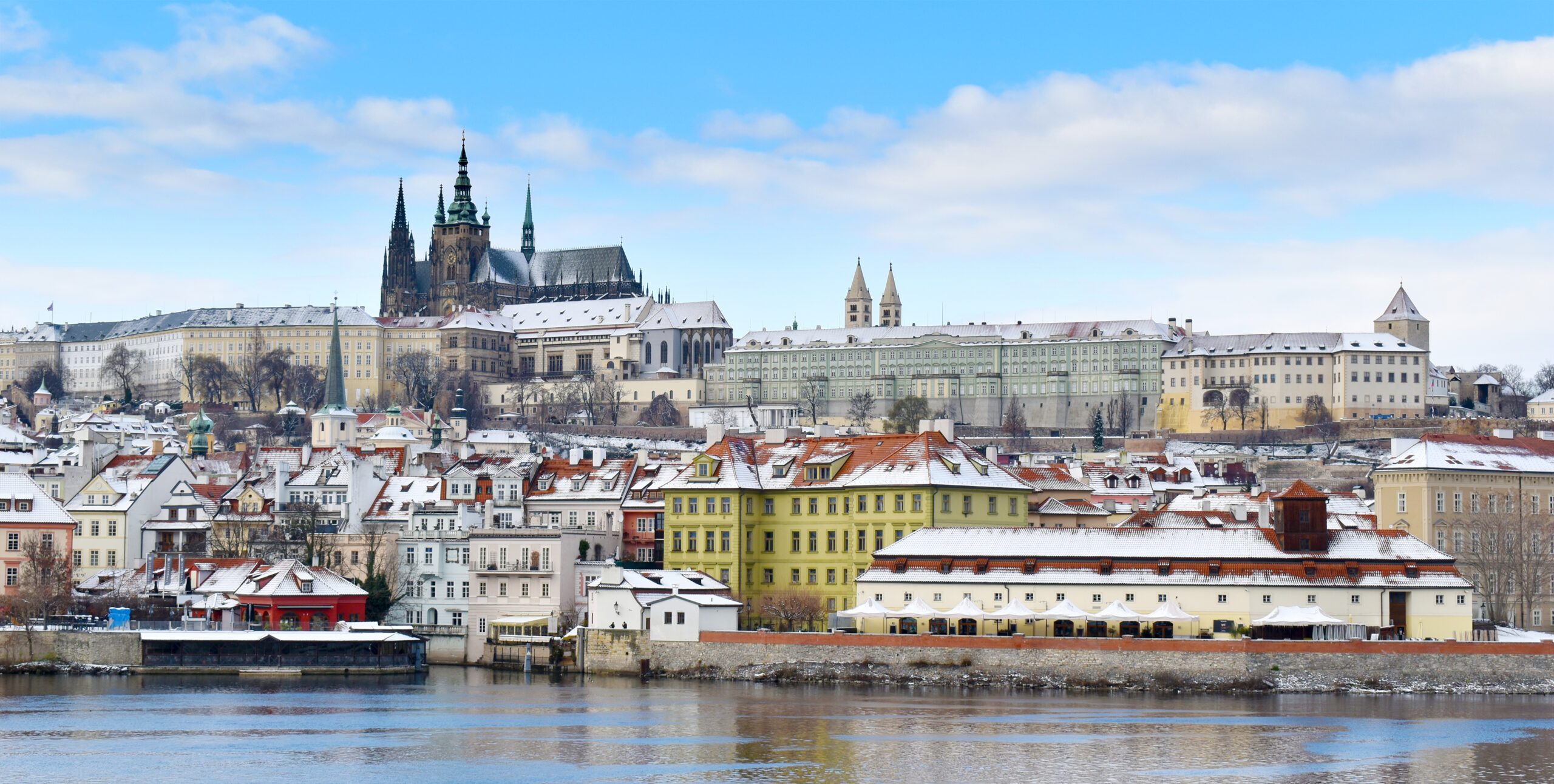 View of the castle and cathedral of Prague from the Vltava river 