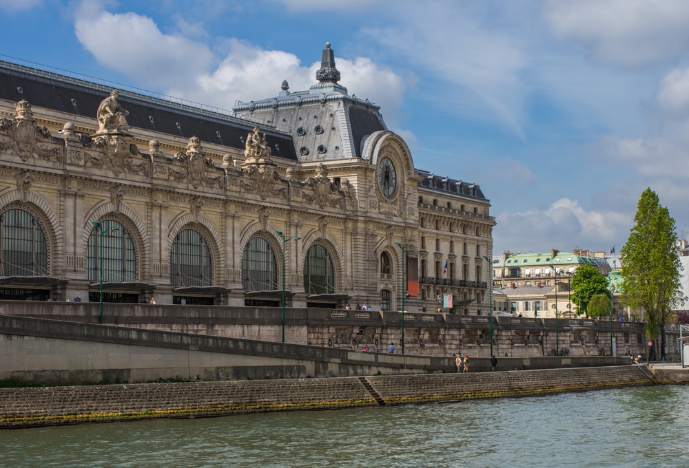 The outside of the Musee D'Orsay overlooking the Seine river