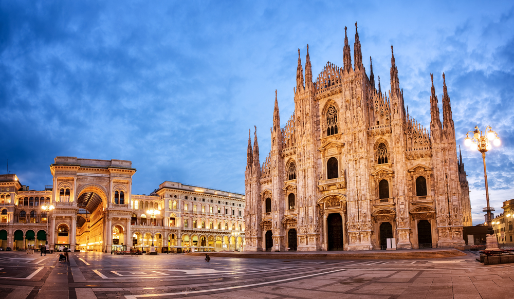 Dusk over the intricate Milan Cathedral on an Italy road trip.