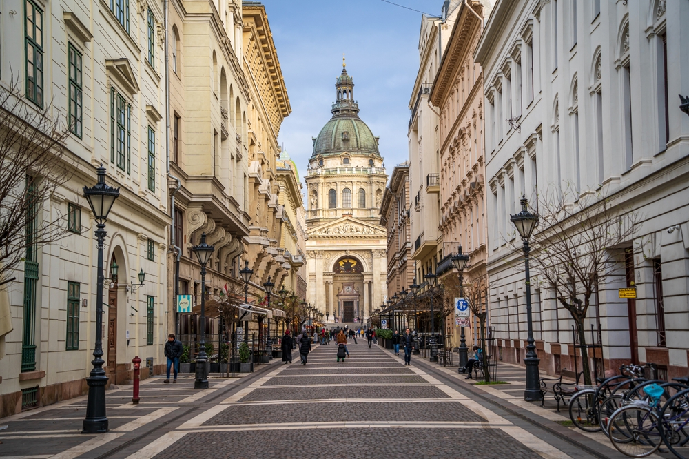 St. Stephens Basilica Catholic Cathedral street in Budapest Hungary. There are not many people in the street because it is winter time, but the city is still very beautiful. this is one of the best places to visit in Europe in February 