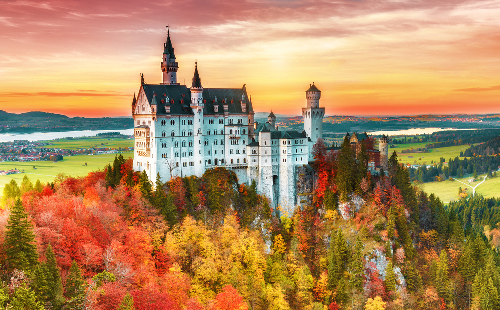 Beautiful aerial view of Neuschwanstein castle in autumn season. Palace situated in Bavaria, Germany. Fall is one of the best time to vissit Europe. 