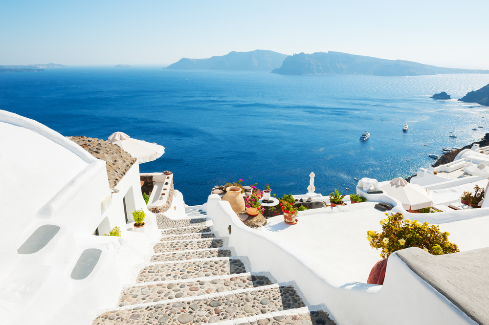 White architecture on Santorini island, Greece. Beautiful summer landscape, sea view.