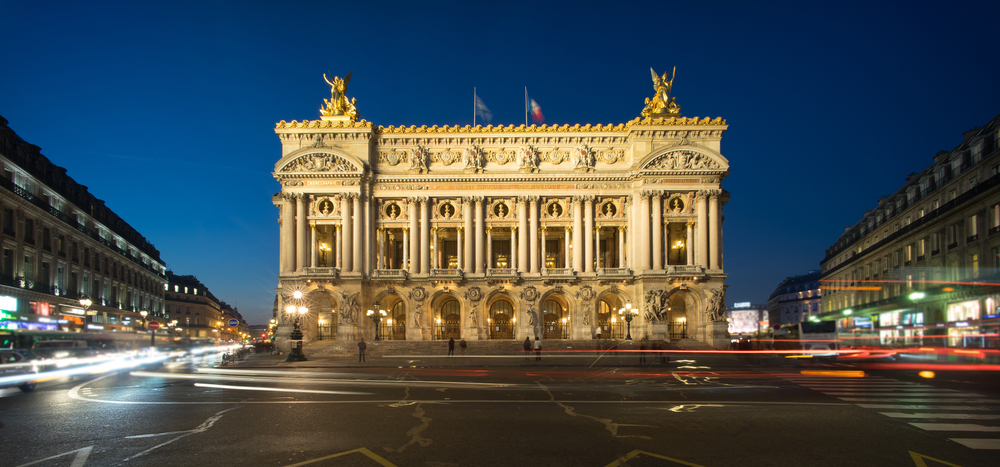 THe Opera house in Paris light up in the evening is an example of Paris Architecture