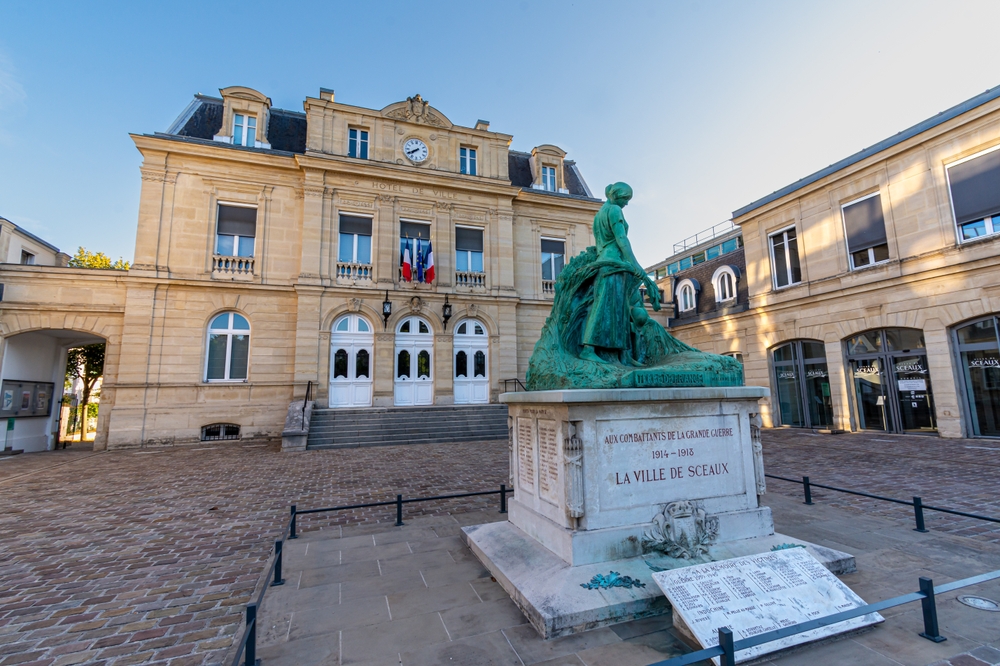 Exterior view of the city hall of Sceaux, a town located in the southern suburbs of Paris. A war memorial is in the foreground. 