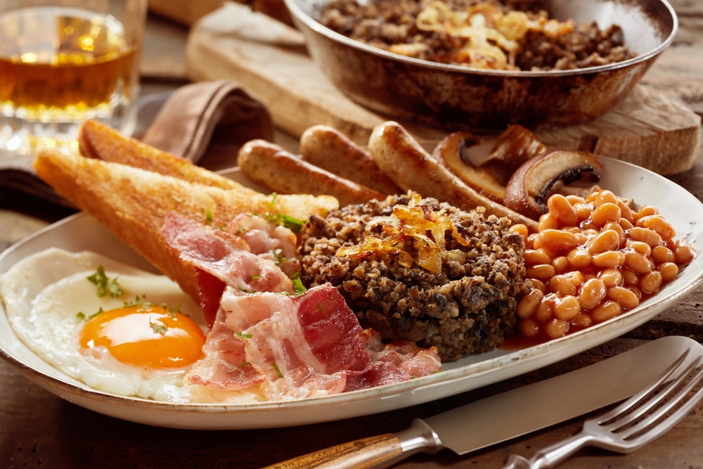 A typical Scottish Breakfast with eggs, beans, haggis, sausage and bread is a must on your 2 days in Edinburgh itinerary