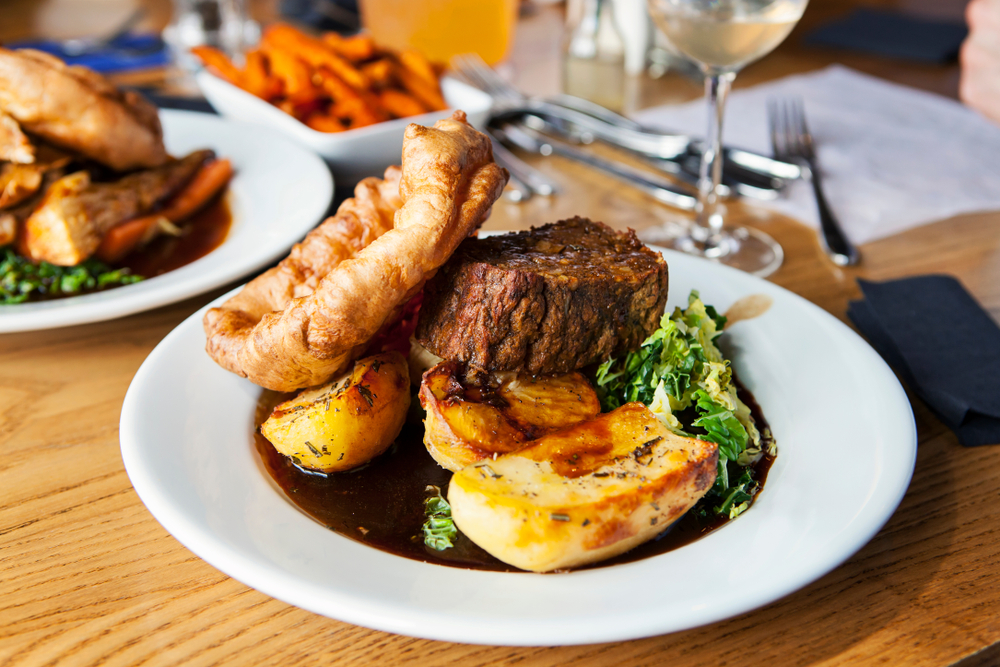 A Sunday Roast has roast meat, puff pastry, and potatoes with a sauce