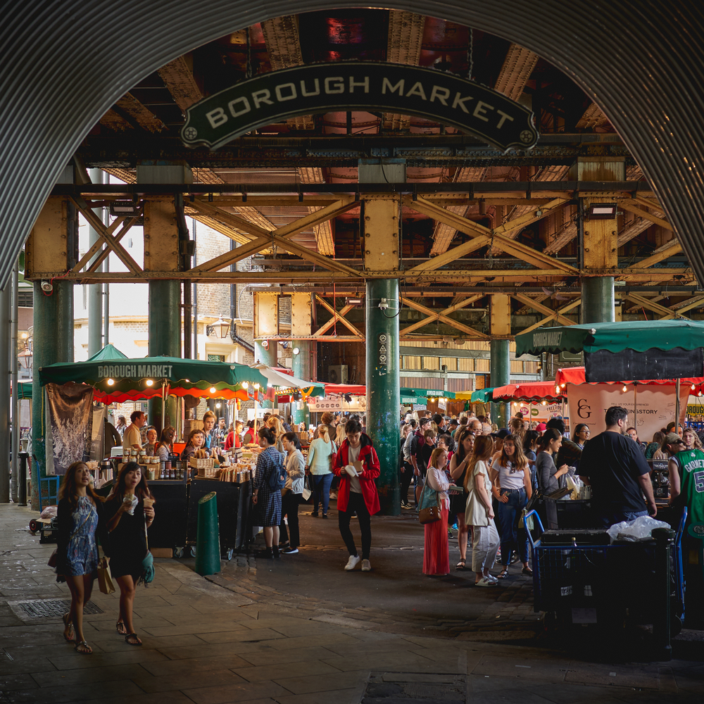 the lively borough market where you can find tons of people trying differnt foods