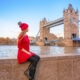 A girl in red with tower bridge in background