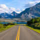 Going-to-the-Sun Road heading toward a lake and mountains on a Montana road trip.