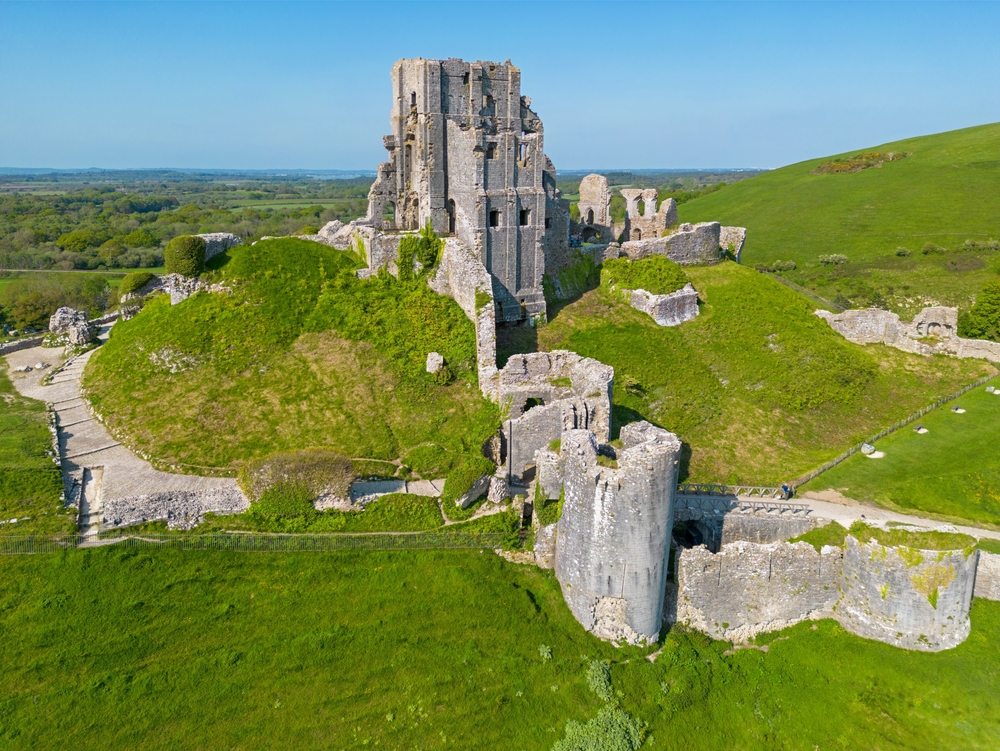 Spring time Aerial Image of 11th Century built Corfe Castle. 