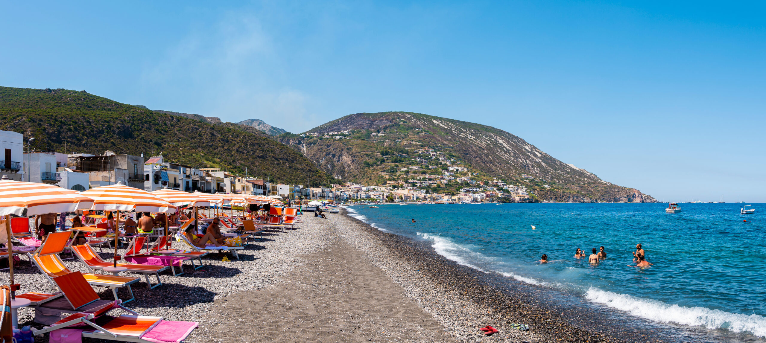 The remote and gorgeous crescent shaped bay of Canneto Beach