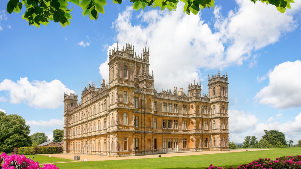 Highclere Castle, filming location for Downton Abbey in Hampshire, England. One of the castles near London. 