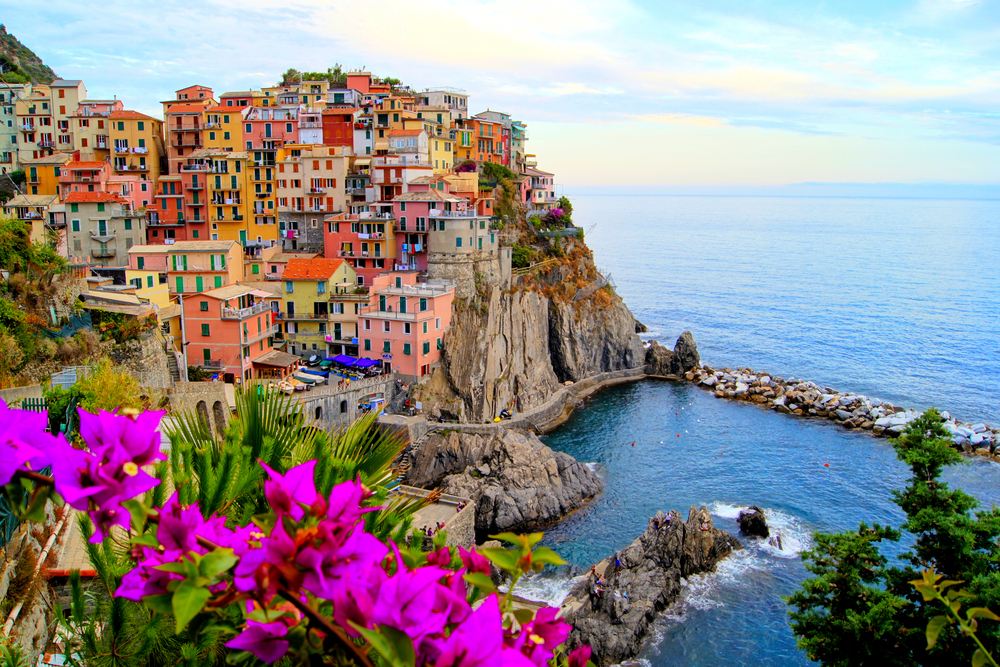 Village of Manarola, on the Cinque Terre coast of Italy with flowers. 