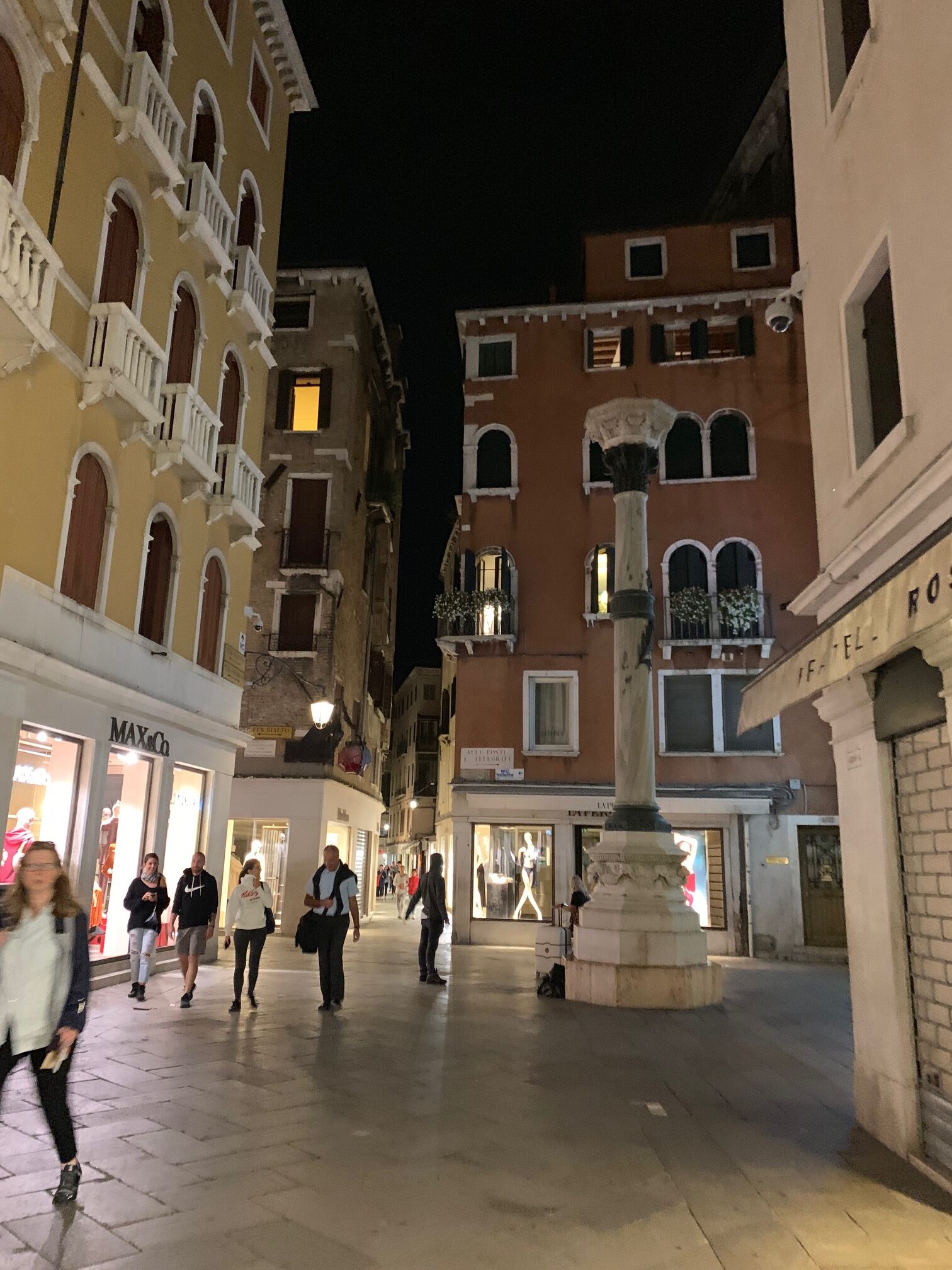 explore Venice at night for fewer crowds as see in this town square