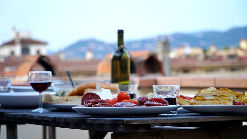 wine and some food at a rooftop bar in florence