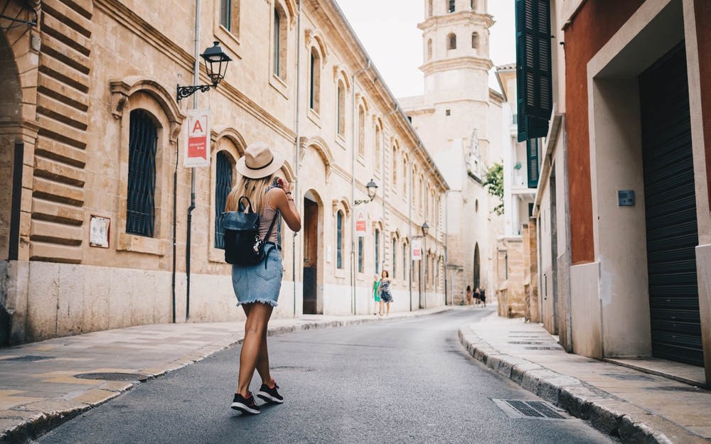 A girl walking down the streets in florence