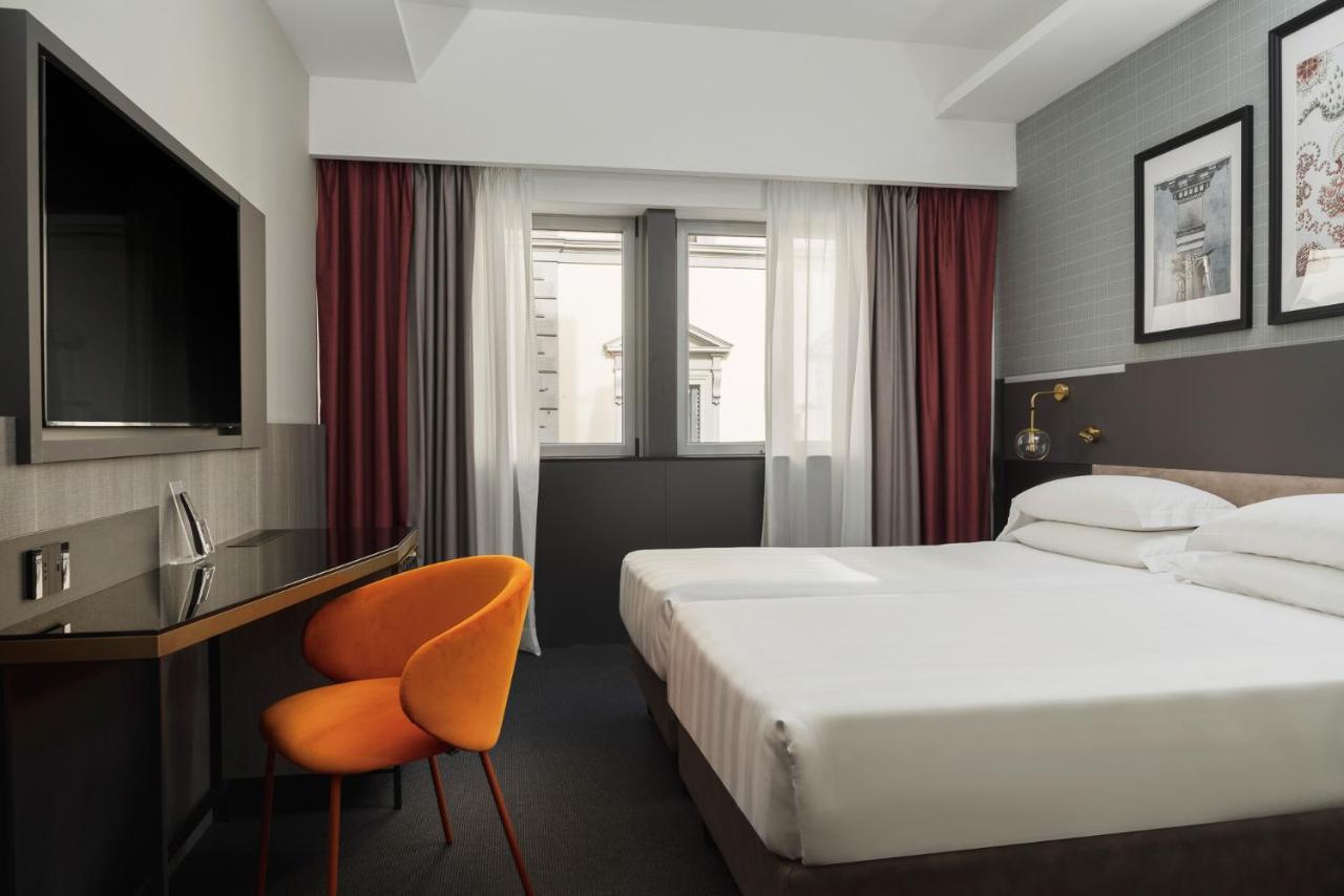 the ultramodern hotel iQ Hotel Firenze with crisp clean rooms