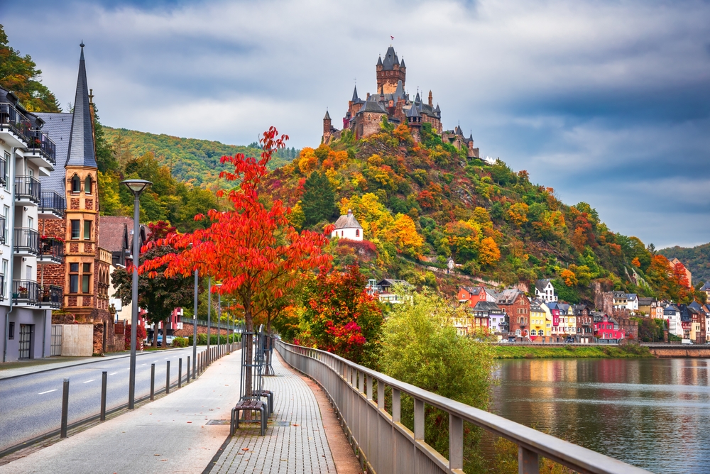 Cochem historical romantic town on Moselle river valley, Germany, in red autumn colors