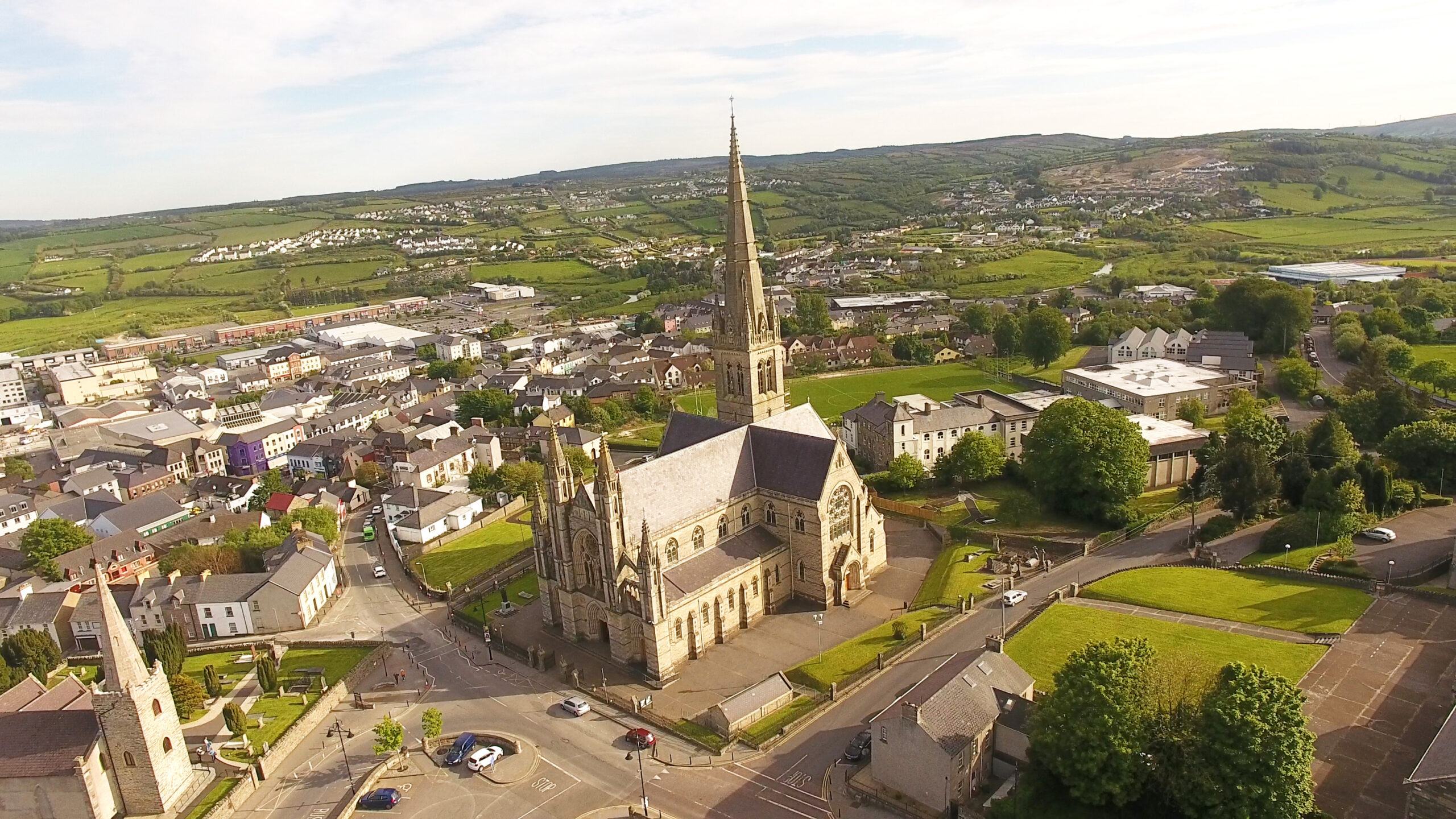 View of the cathedral and surrounding downtown of Letterkenny. The town is surrounded by beautiful rolling Irish hills.