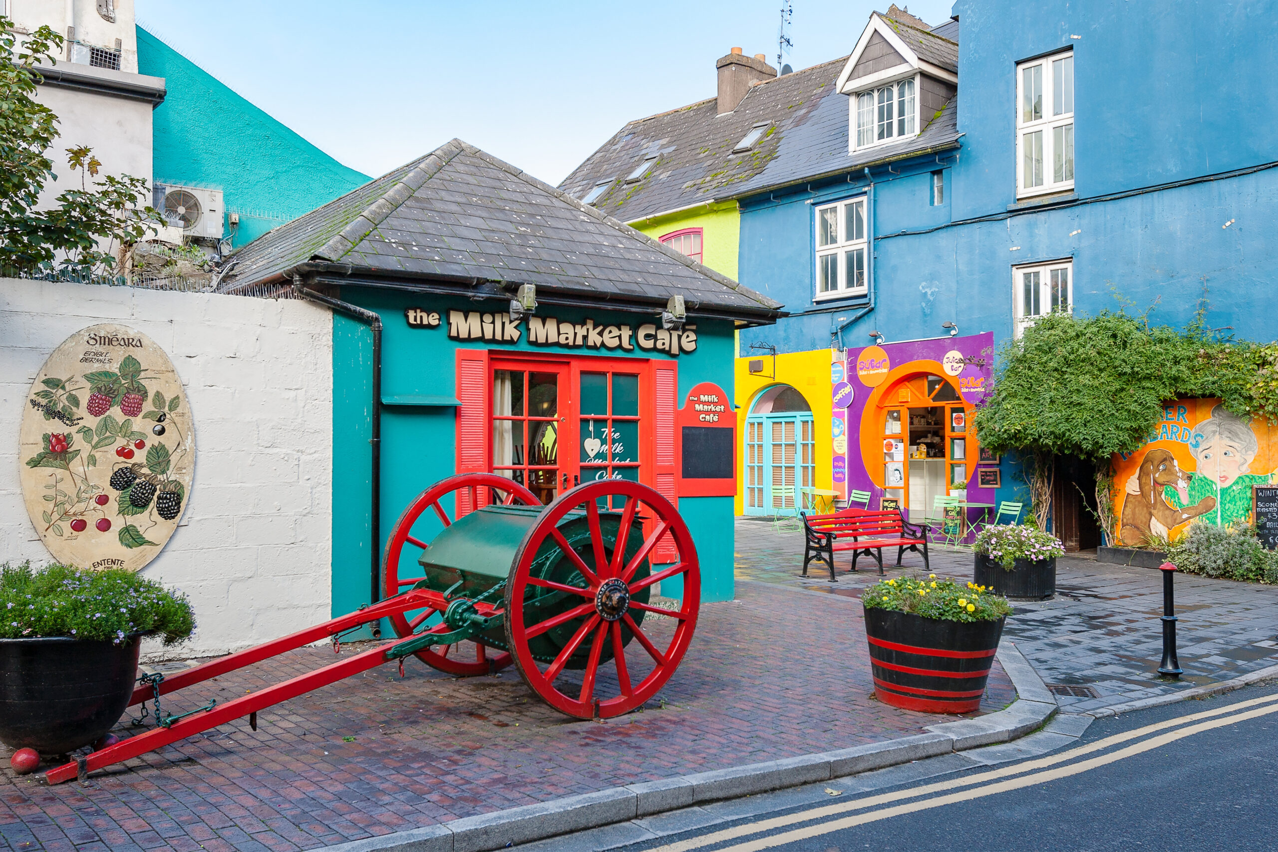View of an old fashioned street with colorful buildings in Kinsale, Ireland